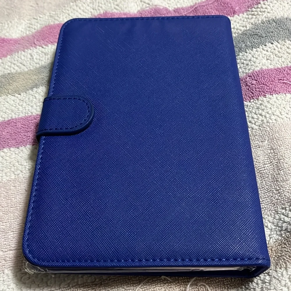 Blue tablet case with keyboard with locking mechanism for tablet